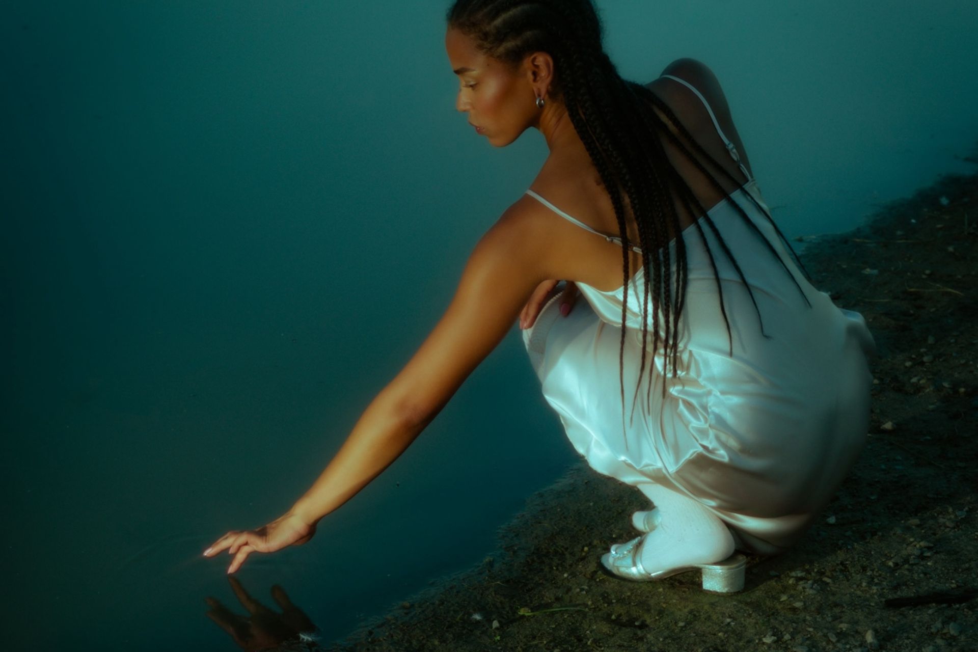 woman touching water
